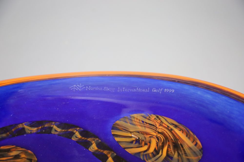 A free blown coloured glass dish, signed R. Weninger, 99, for Norske Skog International Golf, diameter 37cm